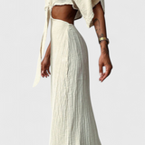 Nerea – Vestido Fluido con Lazo Frontal y Cut-Outs, Elegancia y Comodidad para Cada Ocasión